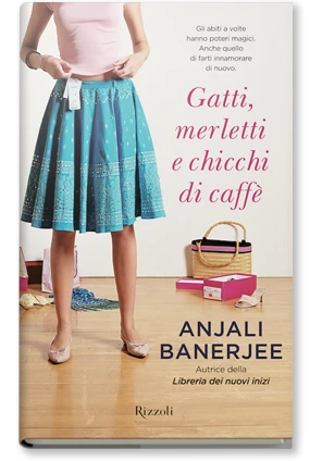 Gatti, merletti e chicchi di caffè