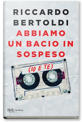 Abbiamo un bacio in sospeso (io e te)